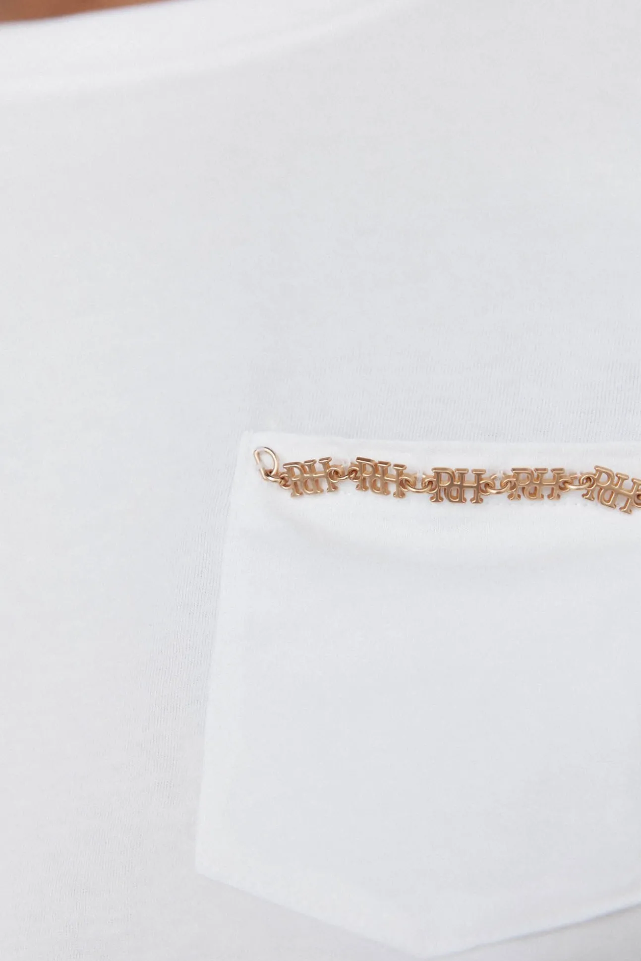 Camiseta bolsillo cadena