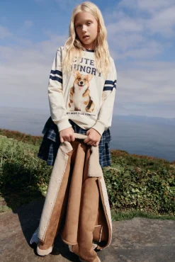 Camiseta de manga larga perro varsity niña