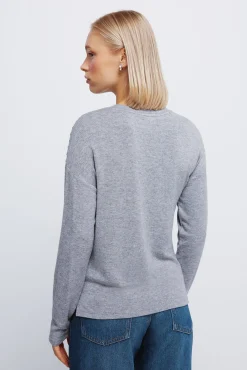 Camiseta punto cortado tachas