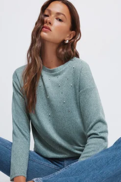 Camiseta tachas posicionadas