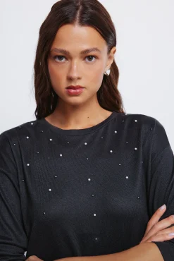 Camiseta tachas posicionadas