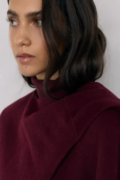 Capa de lana de doble faz traspasada