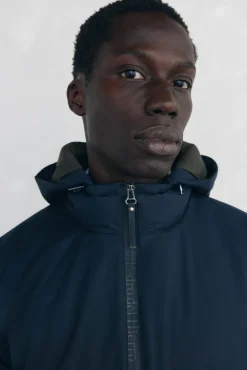 Cazadora cremallera con capucha