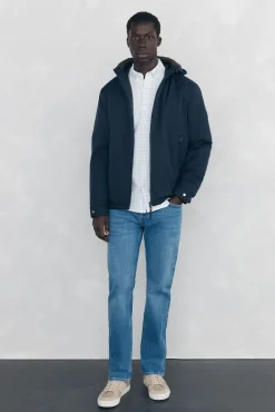 Cazadora cremallera con capucha