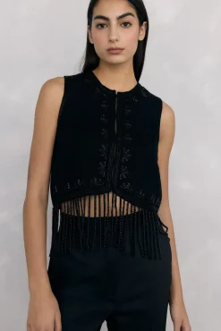 Chaleco de punto bordado flecos