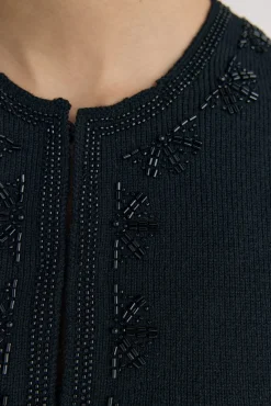 Chaleco de punto bordado flecos