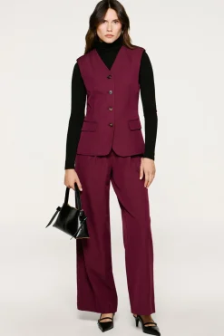 Chaleco traje bolsillos.