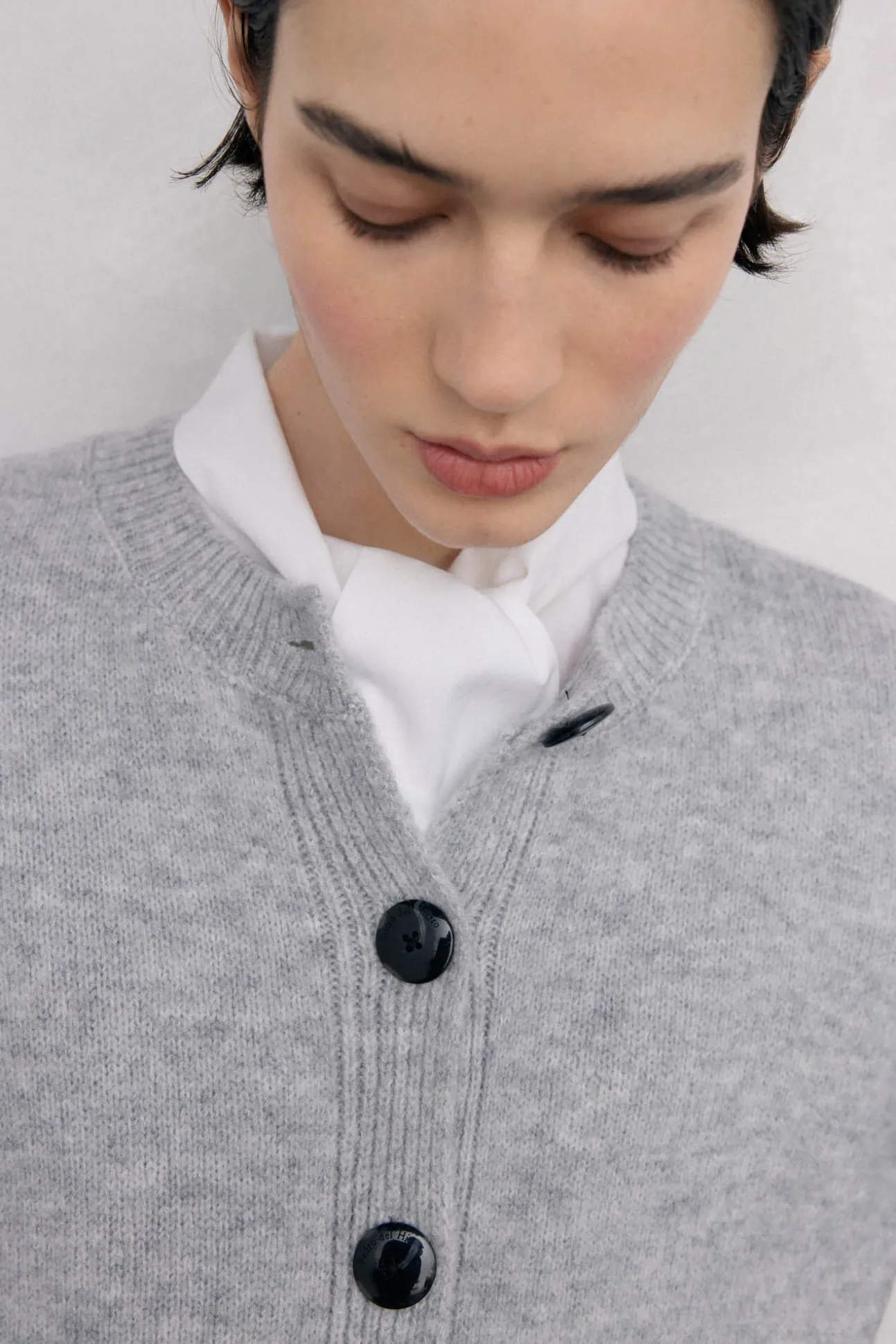 Chaqueta de punto con detalles de ochos