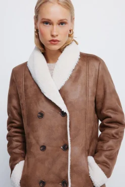 Chaqueta doble faz botones