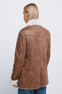 Chaqueta doble faz botones