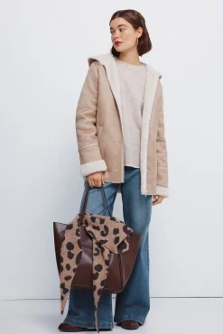 Chaqueta doble faz capucha