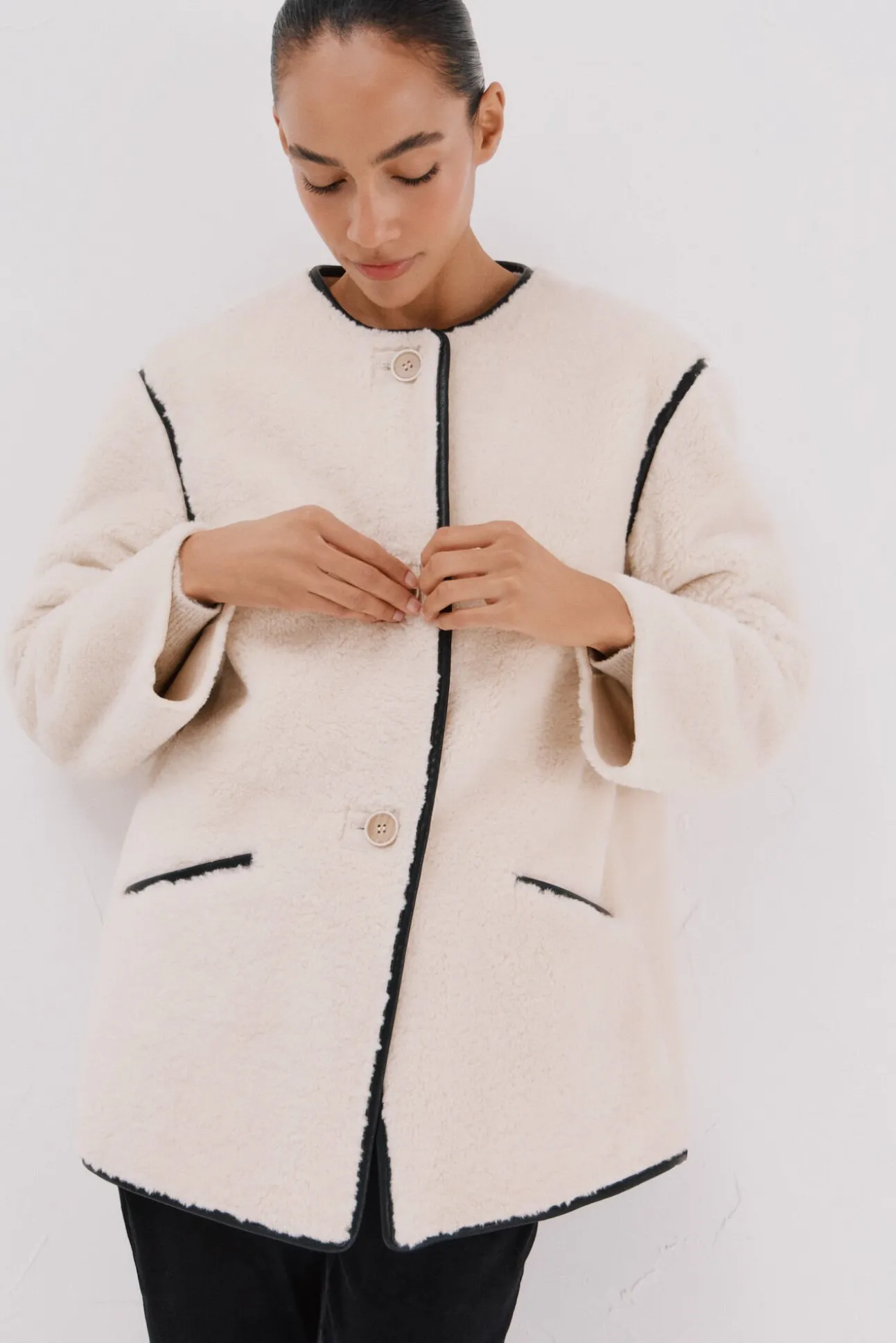 Chaquetón efecto doble faz vivos