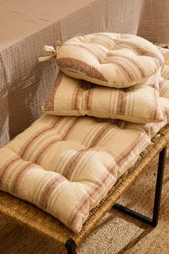 Cojín de silla redondo a rayas en tonos tierra Peru