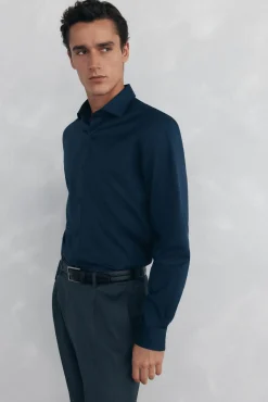 Conjunto de pantalón y camisa