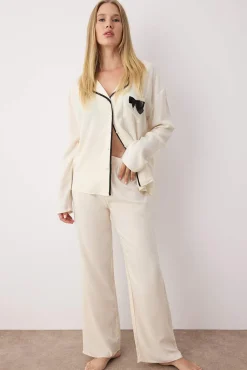 Conjunto pijama camisero viscosa ribetes y lazo