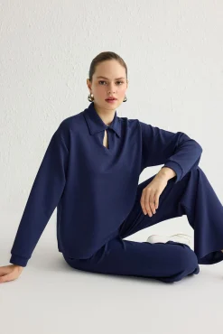 Conjunto top y pantalón con cuello polo Azul