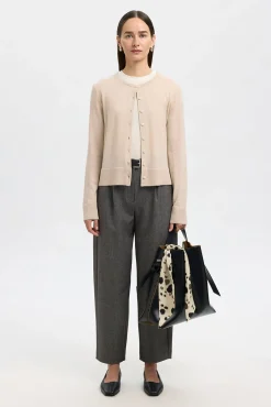 Cárdigan 100% lana merino.