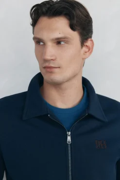 Cárdigan cremallera logo