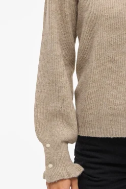 Cárdigan de punto con volantes en puños