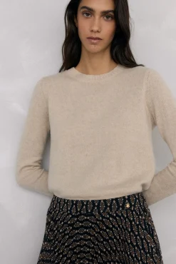 Doble prenda jersey y capa con detalle volante