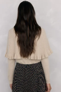 Doble prenda jersey y capa con detalle volante