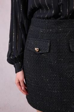 Falda corta detalle corazones