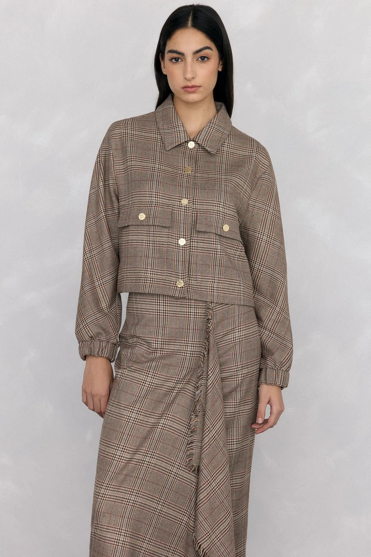 Falda midi cuadros volante desflecado