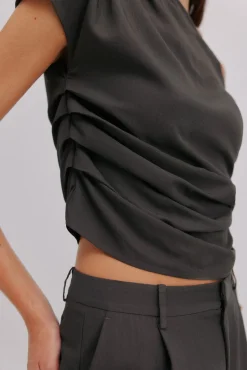 Gisèle. Top asimétrico