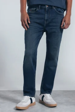 Jeans en knit denim sobretintado slim fit