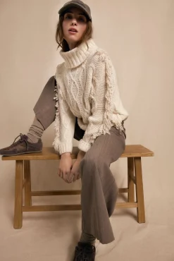 Jersey aranes y flecos