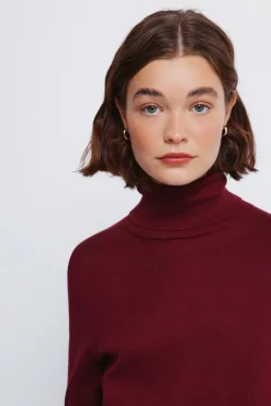 Jersey cuello alto botones puños