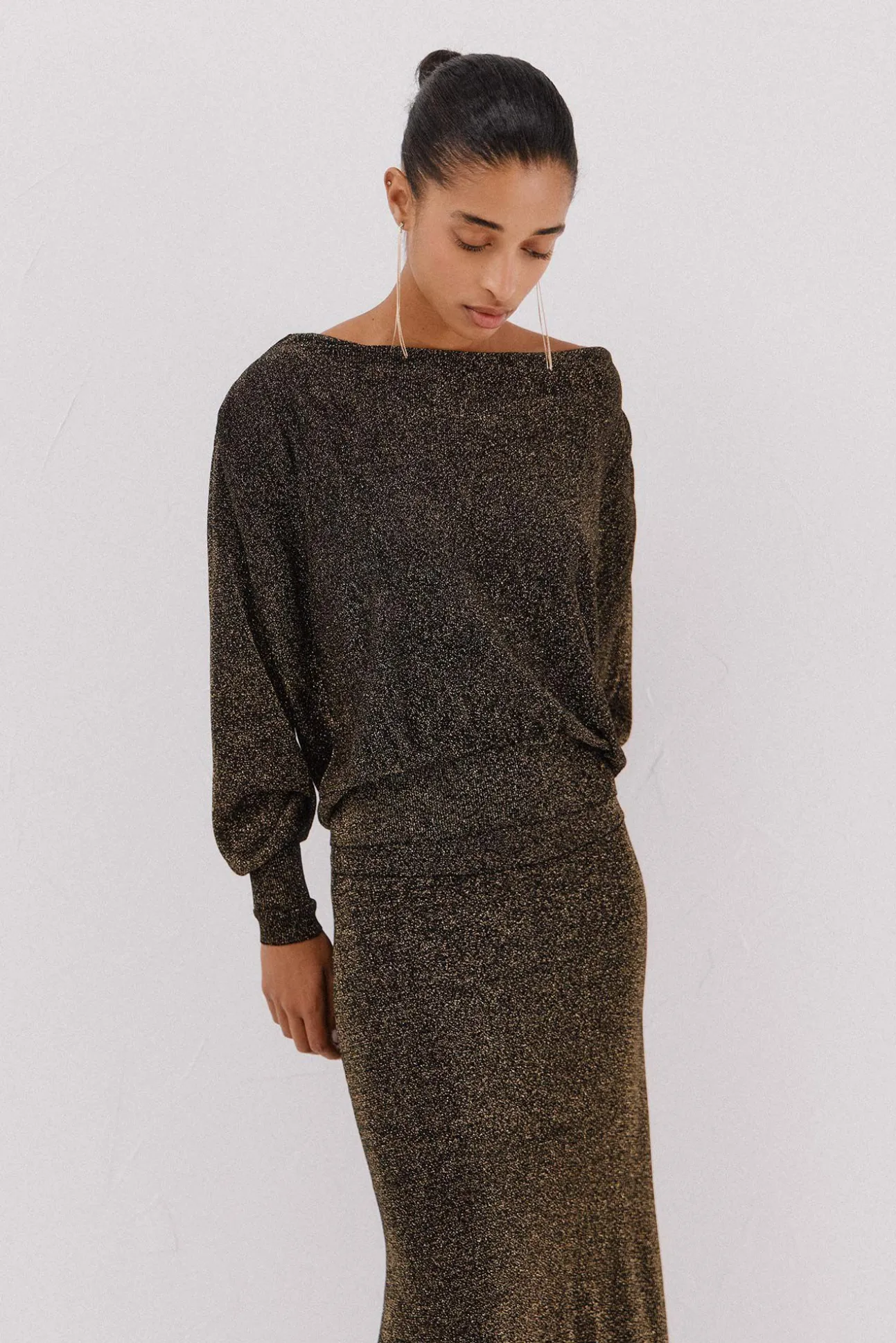 Jersey cuello drapeado.