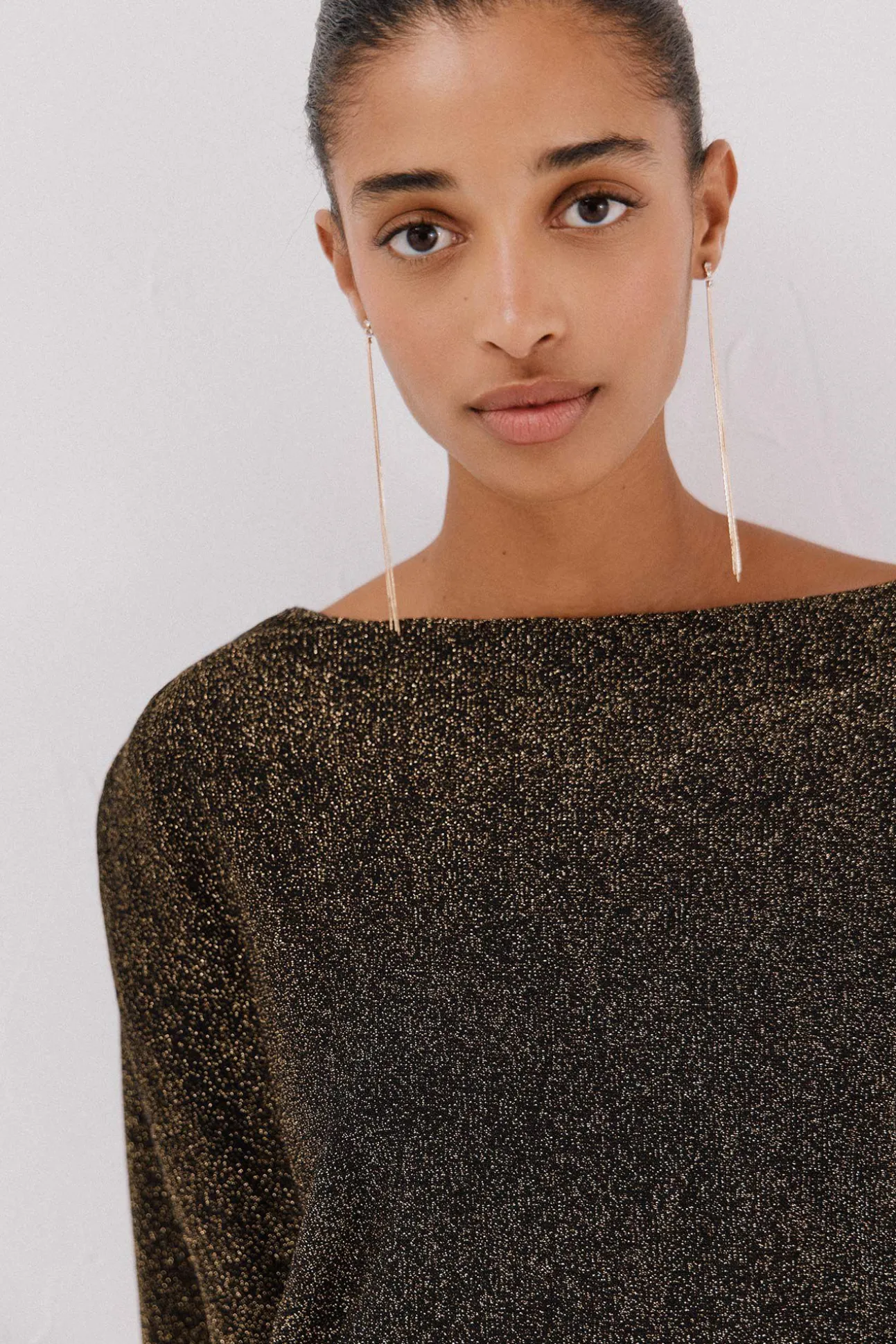 Jersey cuello drapeado.