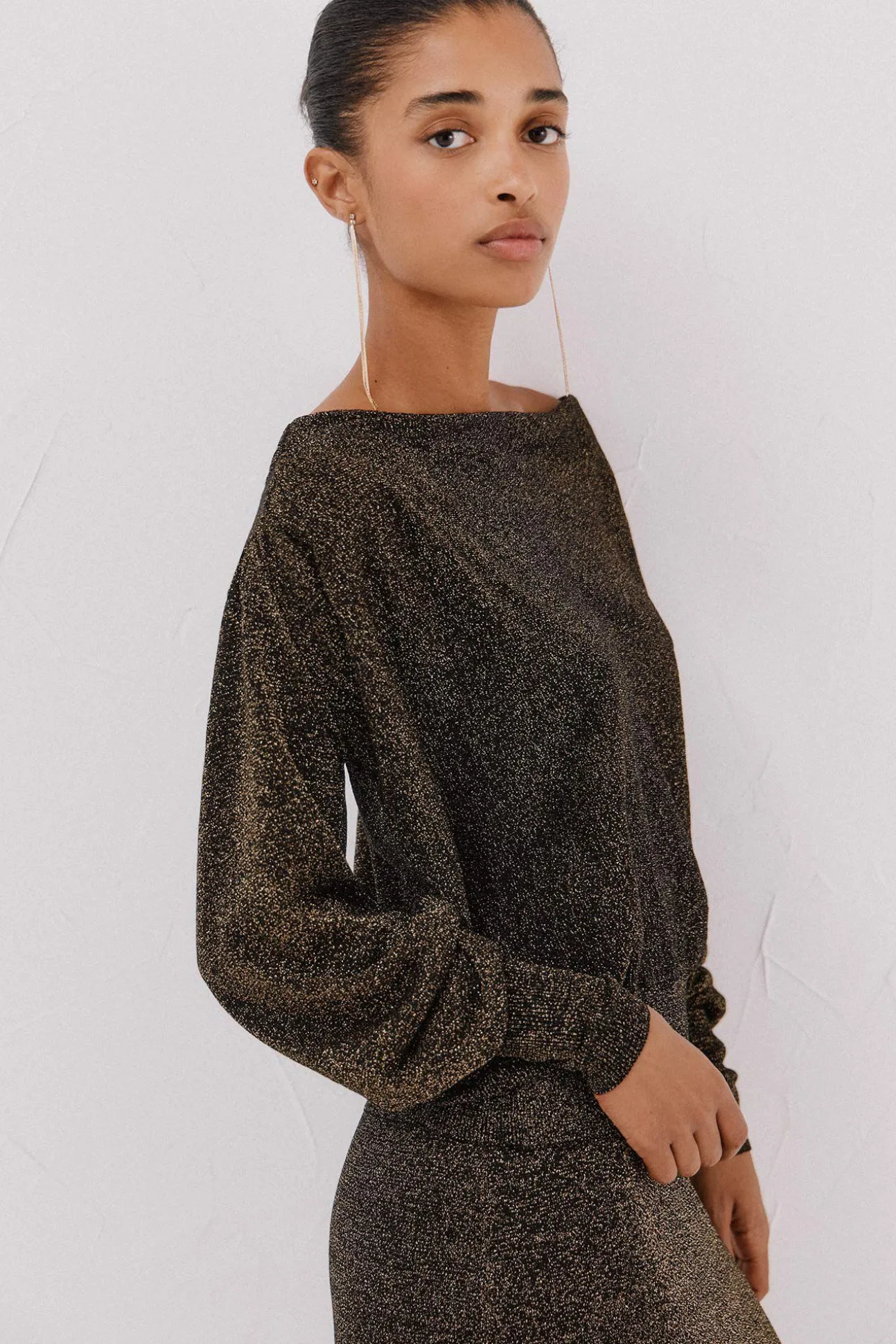 Jersey cuello drapeado.