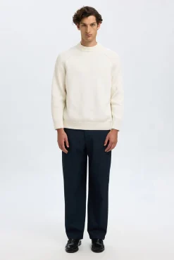 Jersey cuello mock 100% algodón orgánico.