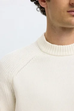 Jersey cuello mock 100% algodón orgánico.