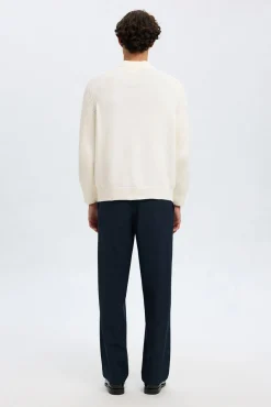 Jersey cuello mock 100% algodón orgánico.