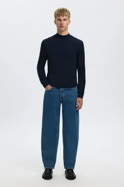 Jersey cuello mock 100% lana merino.