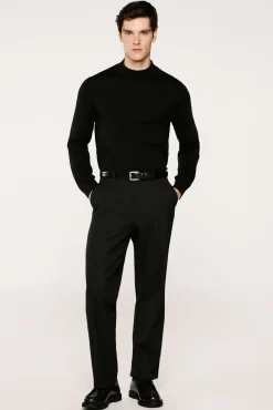 Jersey cuello mock 100% lana merino.