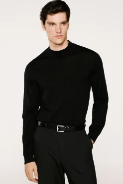 Jersey cuello mock 100% lana merino.