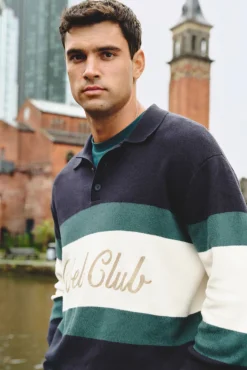 Jersey cuello polo texto bordado