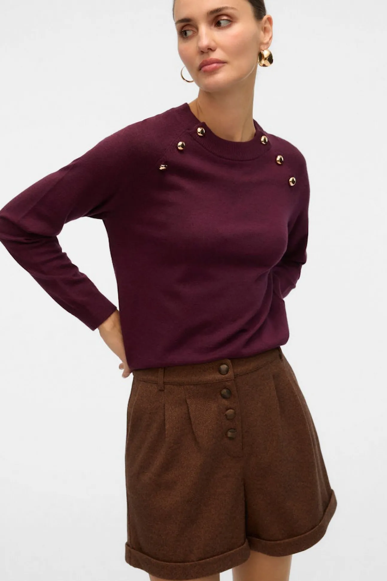 Jersey de punto botones dorados