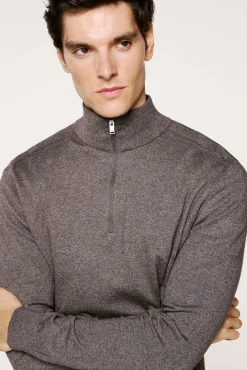 Jersey media cremallera 100% algodón.