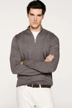 Jersey media cremallera 100% algodón.