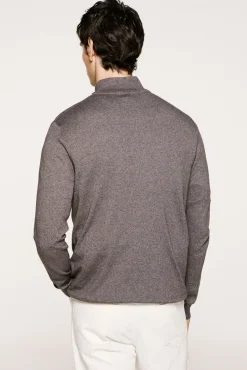 Jersey media cremallera 100% algodón.