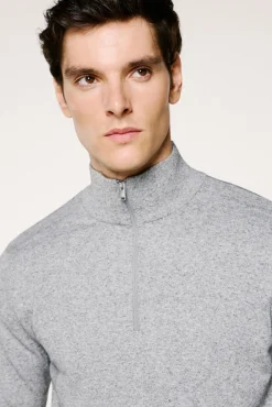 Jersey media cremallera 100% algodón.