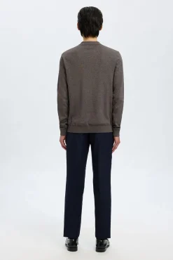 Jersey polo media cremallera 100% algodón.