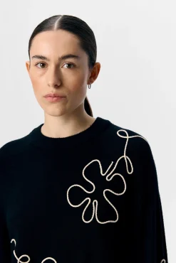 Jersey punto bordado flor