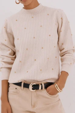 Jersey tachas doradas