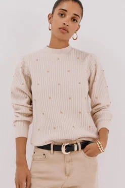 Jersey tachas doradas